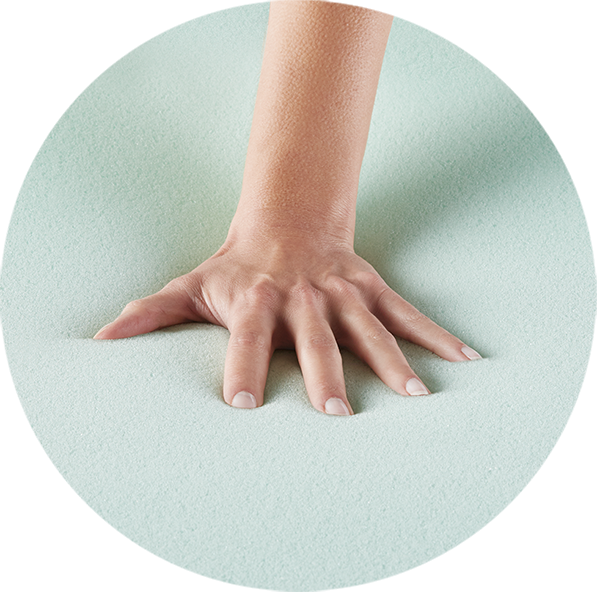 Hand pressing into memory foam